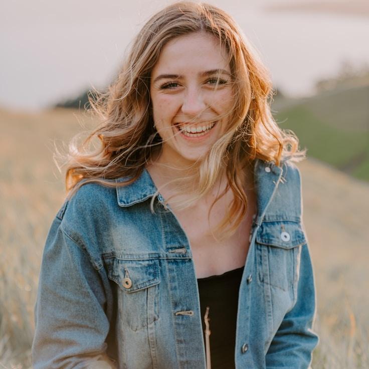 Asha Kapoor, Lead Design Curator at AncientNarrowSearch, reviewing corporate floral arrangements